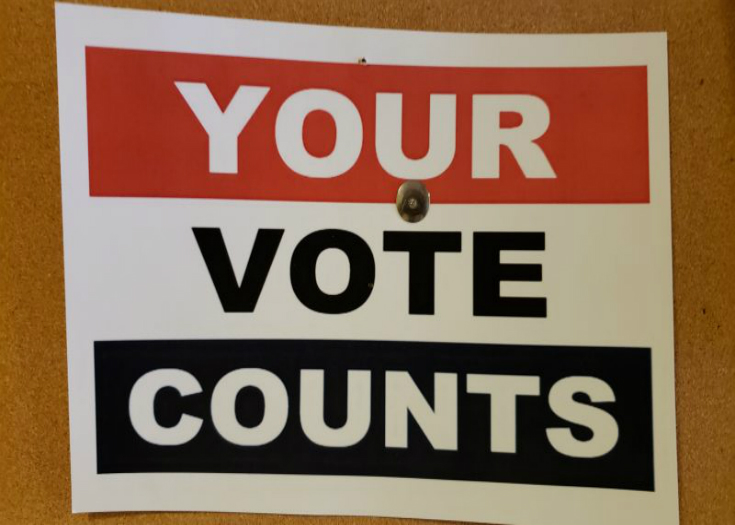 A photo of a sign saying, "Your Vote Counts."