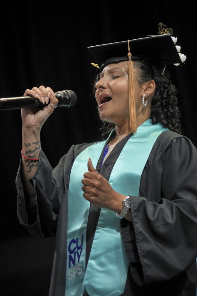 Sasha M. DiBeneditto, a CUNY SPS Child Development Associate Certificate program graduate, flawlessly performs the national anthem.