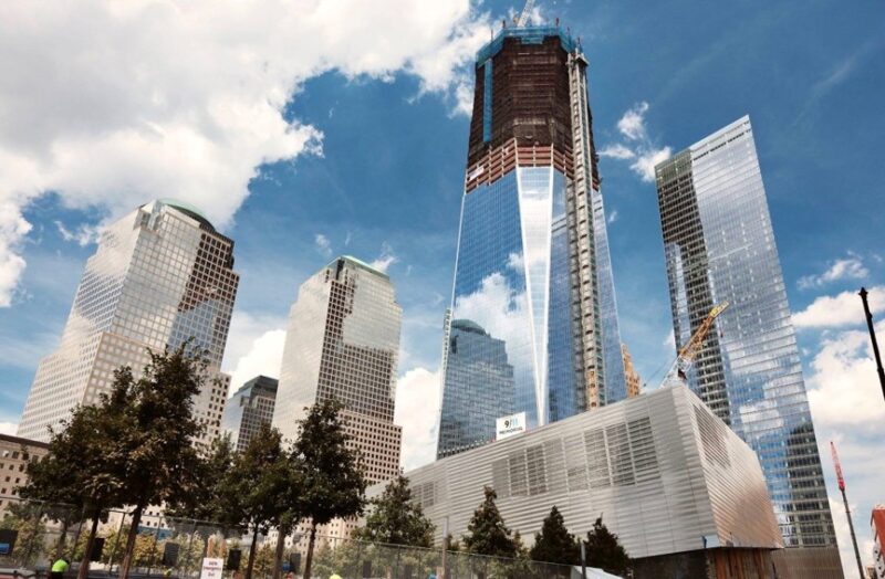 Bright day in New York City. Upward shot of the Freedom tower being built.